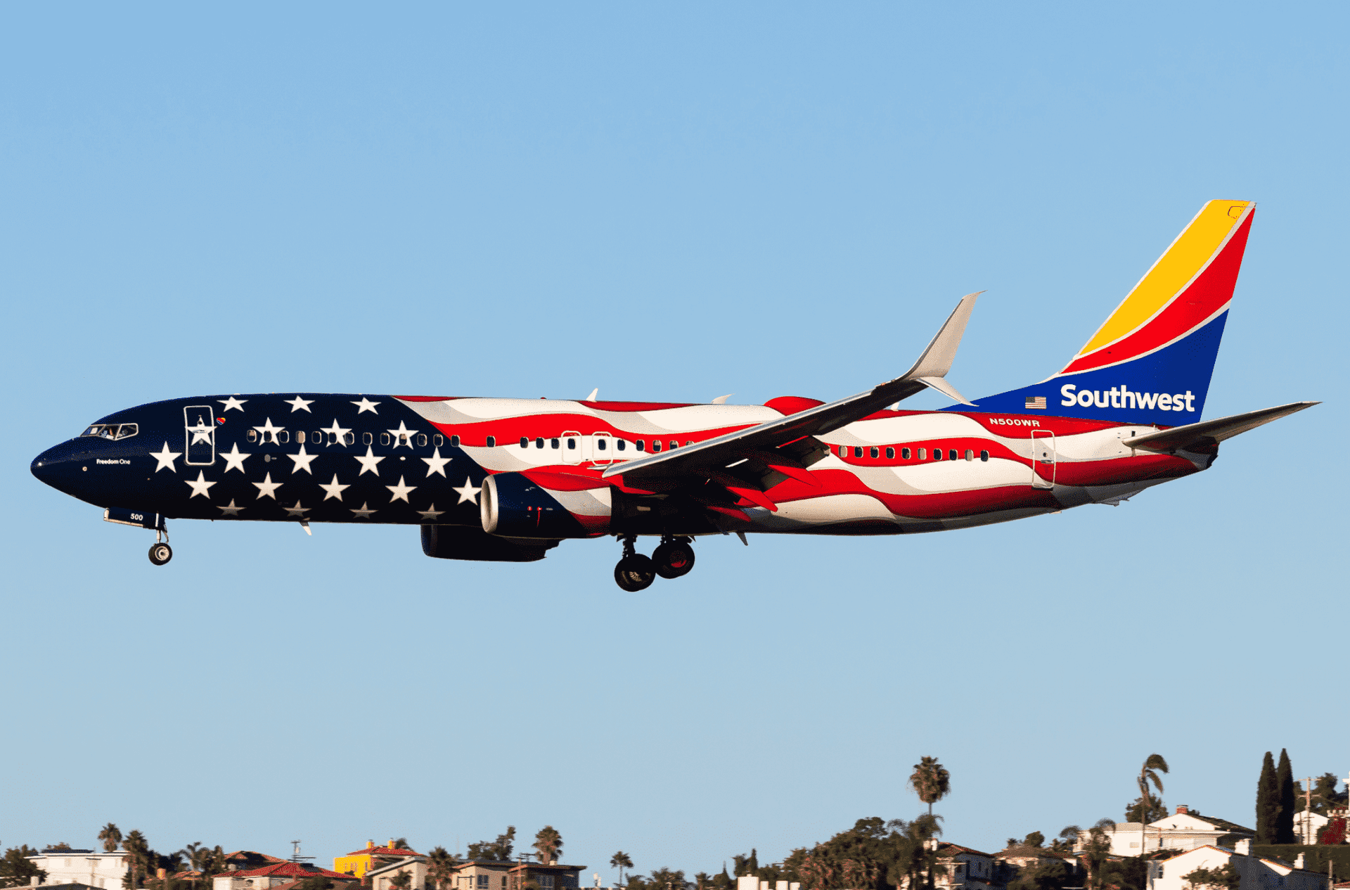 Southwest's "Freedom One" livery jet on short final to San Diego International Airport.