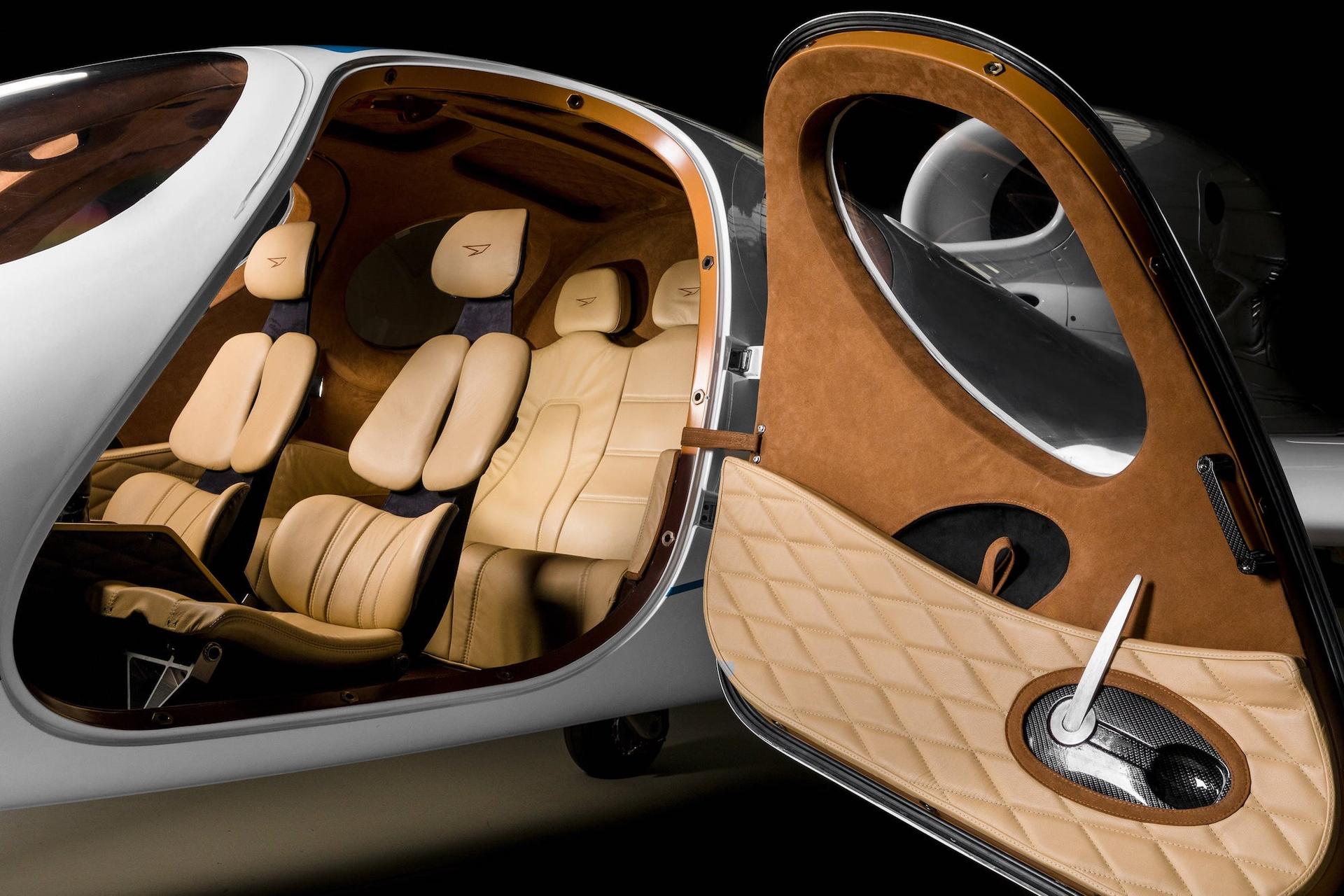 The tan leather interior of a Flaris LAR 01, with brown accent trim.