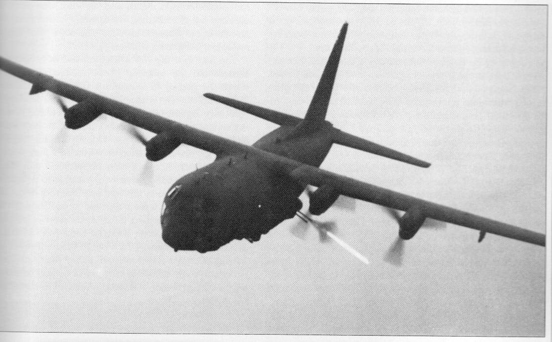 An old black and white photo of an AC-130.