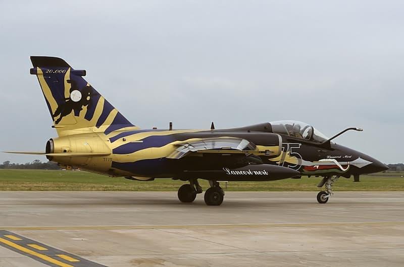 An Italian AMX International AMX painted in the black and gold “75th Anniversary” livery.