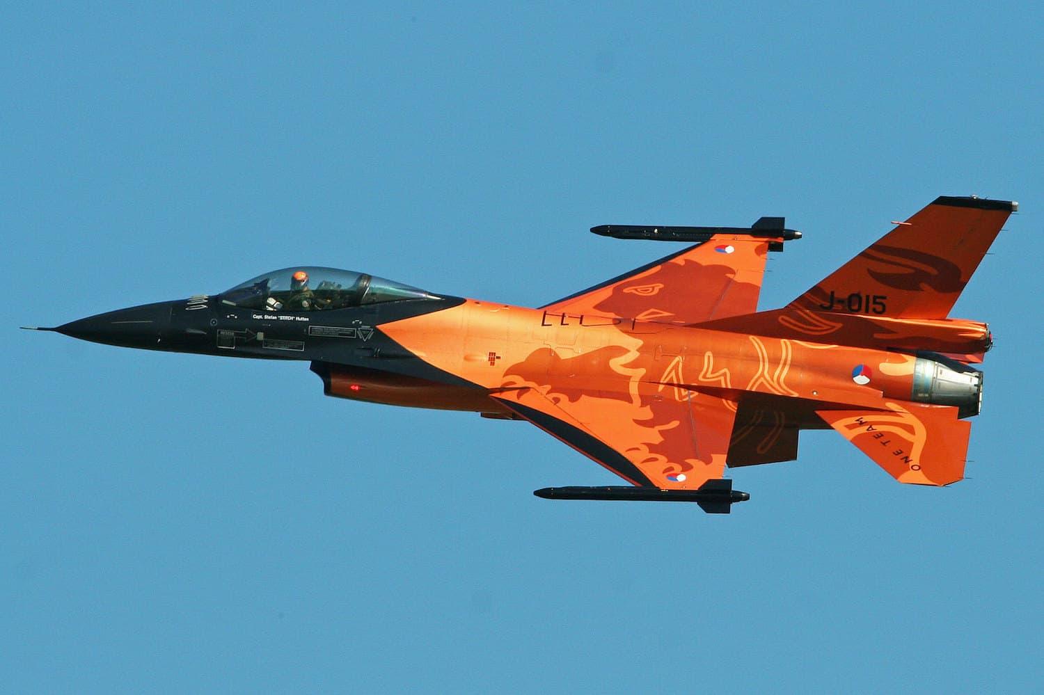 An F-16 from the Royal Netherlands Air Force in an orange NATO Tiger livery.