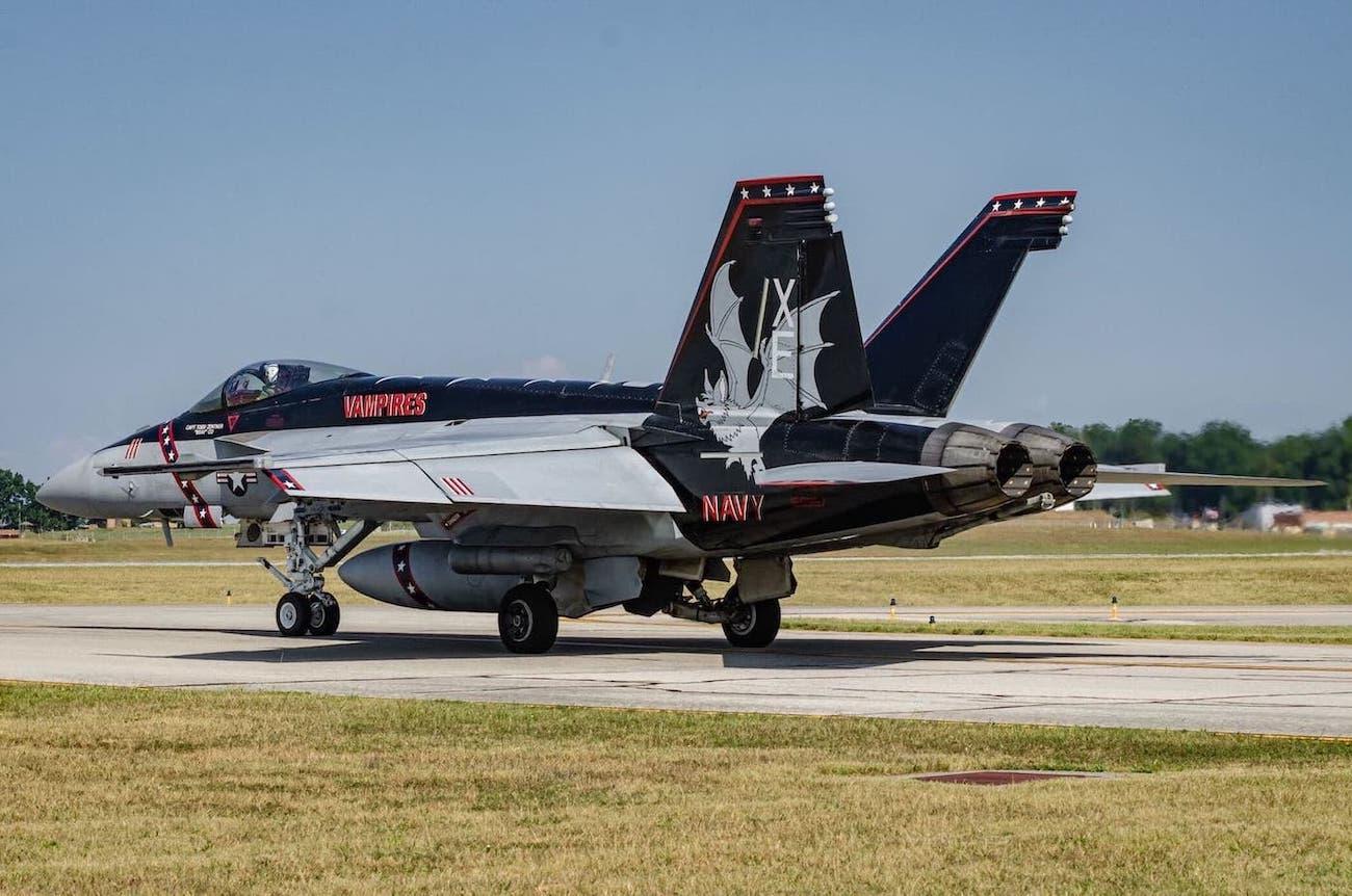 The VX-9 Vampires F-18 sitting on the runway, facing away from the camera.