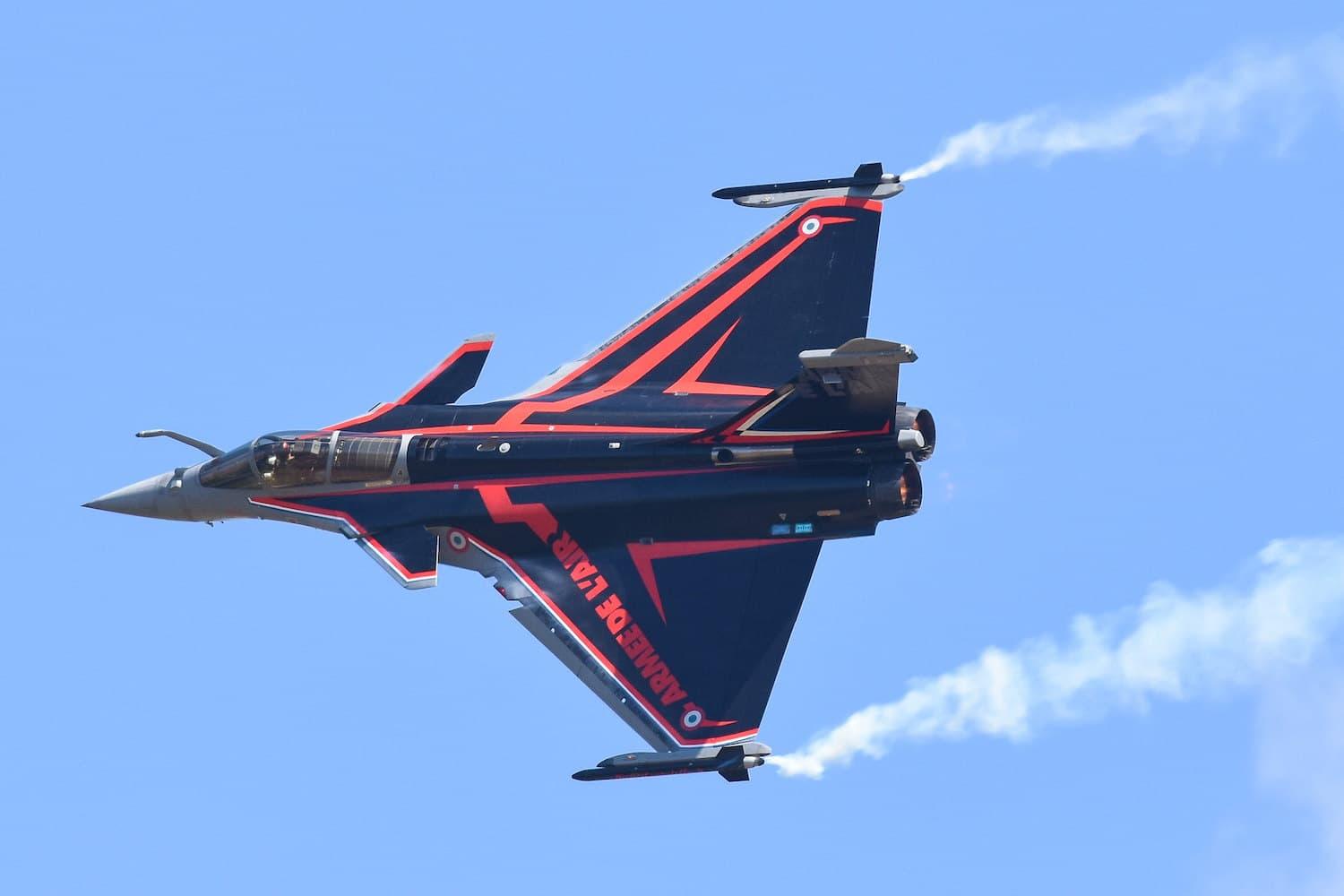 A French Dassault Rafale painted in black with red accents.